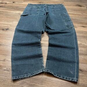 dark wash wrangler carpenter distressed workwear denim jeans
